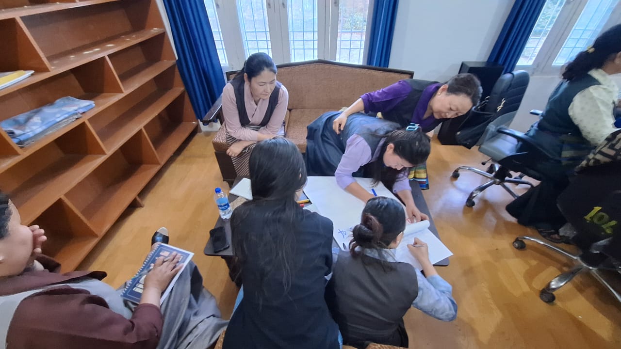 Nurses developing individual, community and family health education plan on HIV